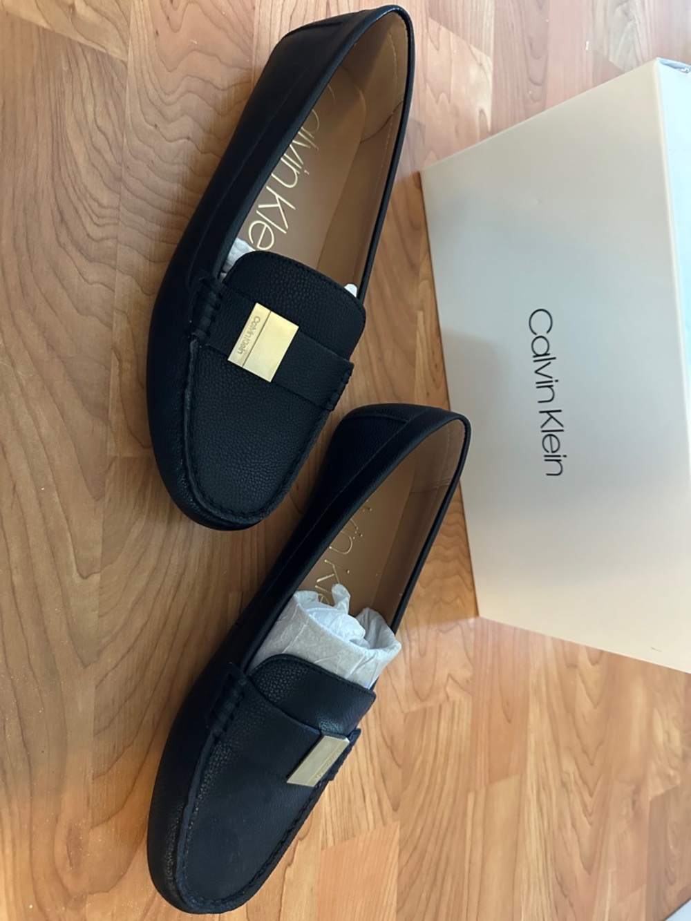 Calvin Klein Black Leather Slip-On Loafers with Gold Accent